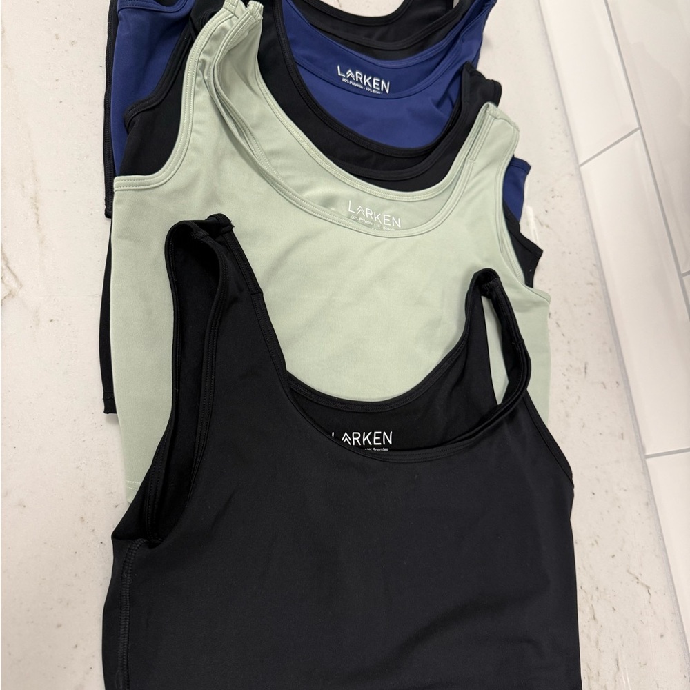 Five Larken X pumping and breastfeeding bras
